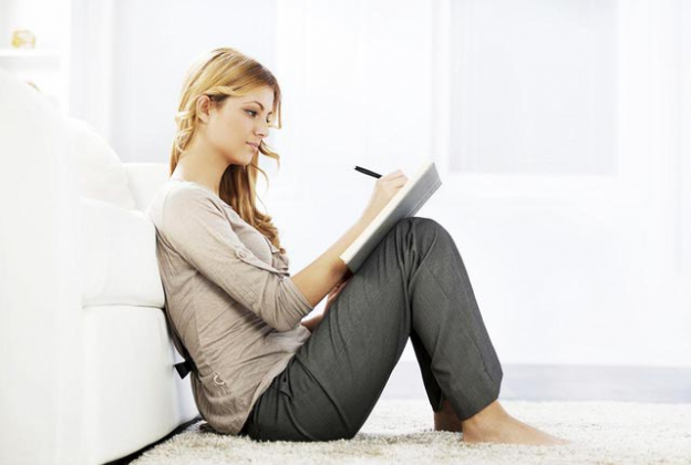 Woman writing chatline greeting
