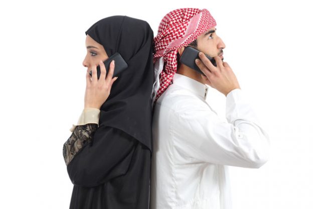 Muslim man and woman talking on a chatline